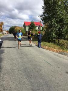 My awesome older son giving me a "high 5" to encourage me along the course.